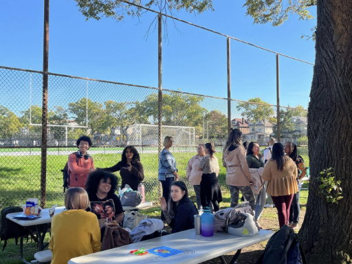 Fort Hamilton students enjoy ice cream and convivial conversation. Photo by Lora Morgenstern.